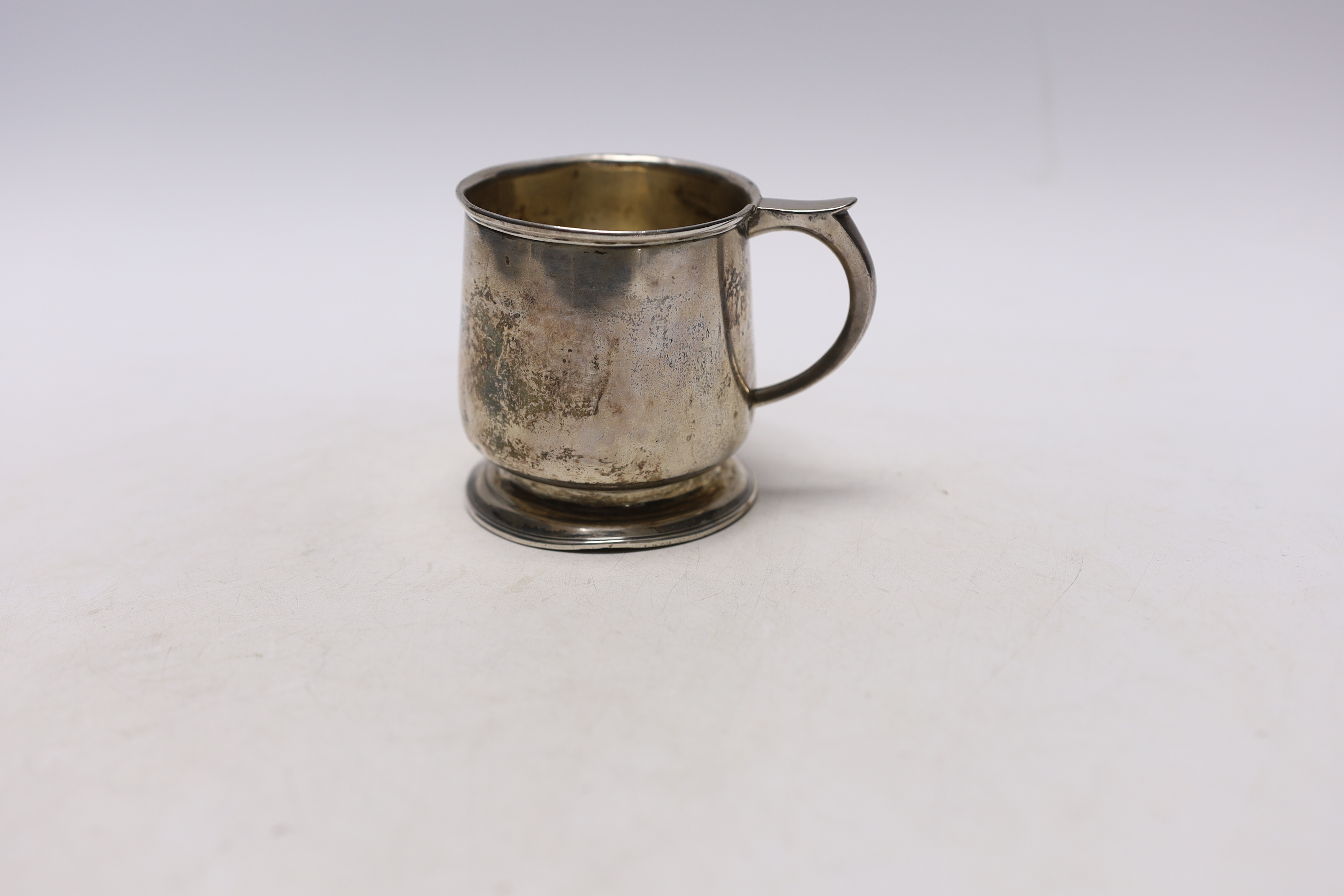 A George V silver christening mug, maker W. Neale Ltd, Birmingham 1927, 76mm.